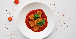 Gnocchi aus Süßkartoffeln und Dinkelmehl in einer Roten Sauce